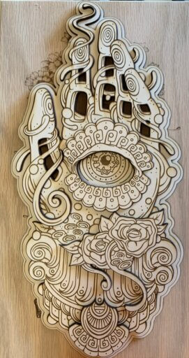 An example of Cutting Edge's layered wood cuttings, available at Gallery Night!